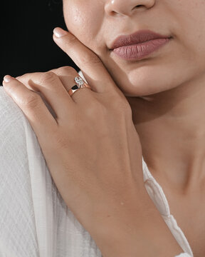 oval shape Diamond engagement gold ring with beautyful ledy hand

