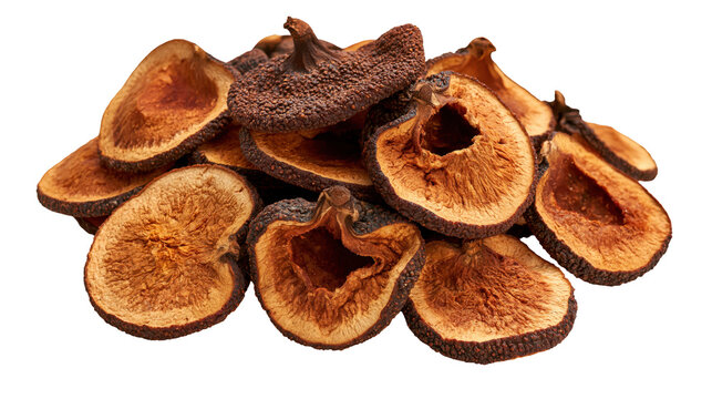 Pile of dried bael fruit slices isolated on a white background for food and botanical reference