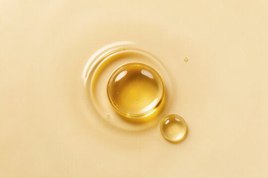 Golden Argan Face Oil Droplets Macro Surface Texture Background