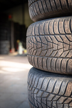 Stacked Car Tires with Tread Detail for Seasonal Tire Change and Road Safety