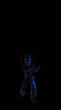 Creepy seamless vertical video of an horror clown with a chainsaw and color strobe lights. Halloween background of a terror character isolated with copy space