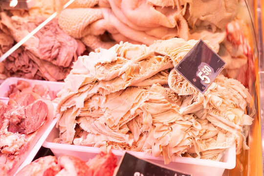 Raw cow tripe on counter of butcher shop