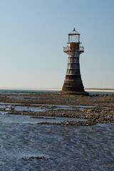 lighthouse on the coast © Roy