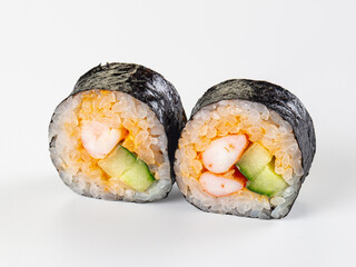 Sushi roll meal featuring white rice and shrimp filling wrapped in dark seaweed served in Asian bistro restaurant setting © Andrei Starostin