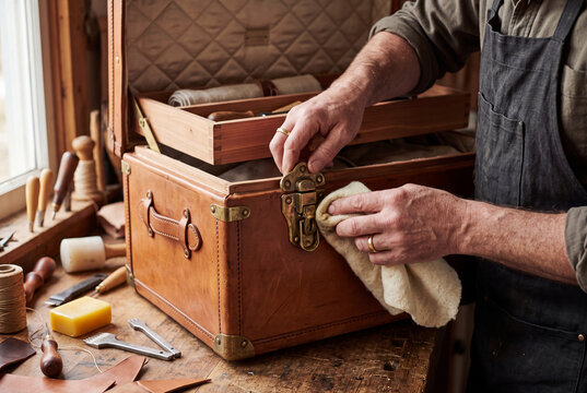 Handcrafted Leather Trunk Restoration with Brass Hardware