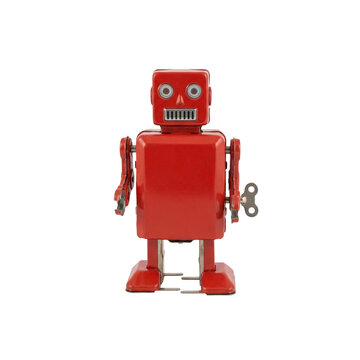 Retro tin toy robot in red lithographed tin with jointed arms, grille mouth and a wind-up key on its back, isolated on transparent background