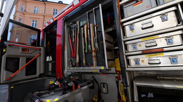 Firefighter rescue tools and emergency equipment arranged inside a response vehicle