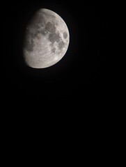 Full moon shining brightly in the dark night sky © Илья Садовник