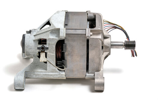 Side view industrial electric motor with copper windings isolated on solid white background.