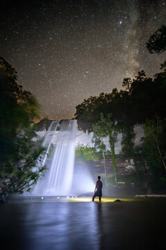 Milky Way Above Huai Luang Waterfall with Explorer Silhouette