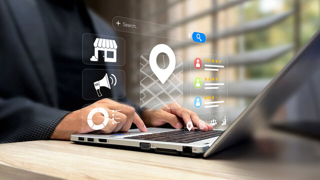 Local SEO, location based marketing strategy, customer engagement, smart navigation for local businesses. Businessman using laptop with map location and digital marketing icons on virtual screen