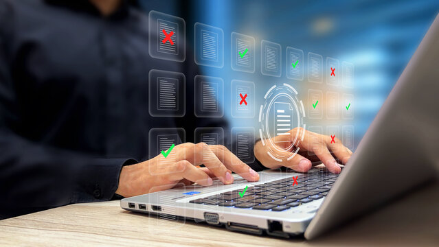 Data analyst using laptop virtual screen to filter approved and rejected files on database. File management system, data sorting and organization for business, document processing concept