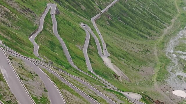 Aerial footage reveals twisting mountain roads and tiny cars on steep hills