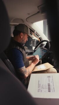 Male courier delivering a package.