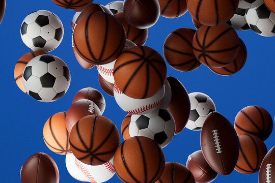 Floating Sports Balls on Blue Background
