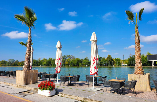 Tables and chairs by the rowing canal, Plovdiv, Bulgaria