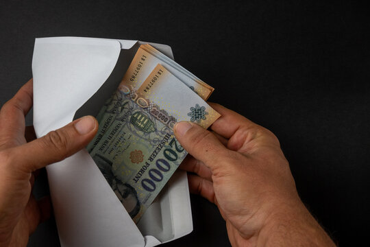 Hungarian Forint Banknotes Inside White Envelope