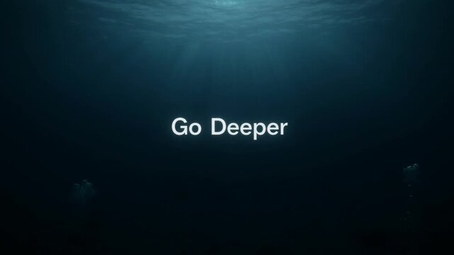 Deep Ocean Water with Sun Rays Shining Through and Inspirational Text "Go Deeper" for Concept Visuals