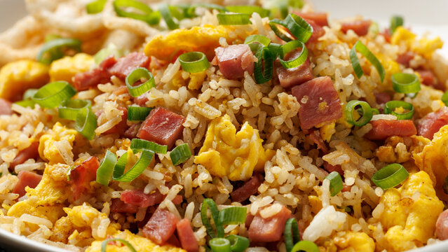 Nasi Goreng Indonesian Fried Rice with Ham, Egg, Spring Onion and Prawn Crackers