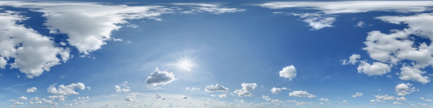 360 hdri blue sky with beautiful clouds with halo like a seamless panorama view with zenith for use in 3d graphics or game development as sky dome or edit drone shot