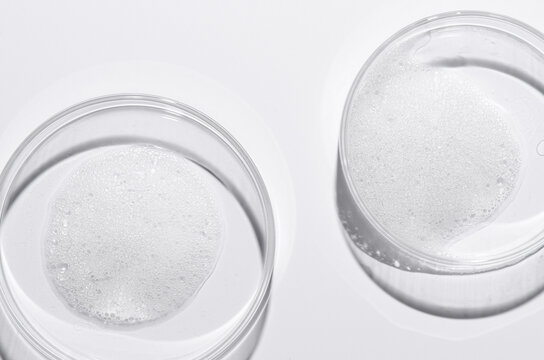 Soap foam in a Petri dish. Facial cleanser.