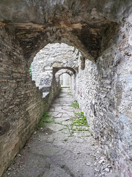 Tallinn, Estonia - 27 July 2026: View of the historic stone arches and ruins of the medieval Pirita Convent in Tallinn, Estonia, featuring weathered limestone walls and a stone pathway.