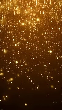 Golden glowing particles and defocused light points drift across a dark amber atmospheric background. Luxury brand, event title sequences, and celebration promos.