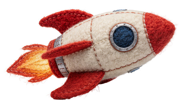 Handmade felt rocket with red fins and orange flame, isolated on transparent background
