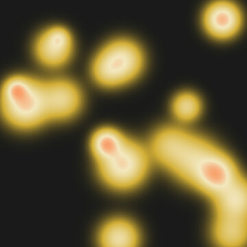 Glowing christmas bokeh lights floating on dark festive background