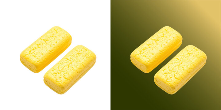 Two rectangular yellow soap bars with a textured surface, isolated on a white background, representing hygiene, skincare, and bath time products