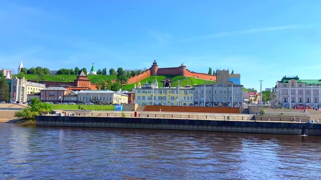NIZHNY NOVGOROD, RUSSIA - MAY 22, 2026: View from a boat at the Volga river. The Nizhnevolzhskaya Embankment, the Kremlin, Church of St. John the Baptist, and the Cathedral of the Archangel Michael