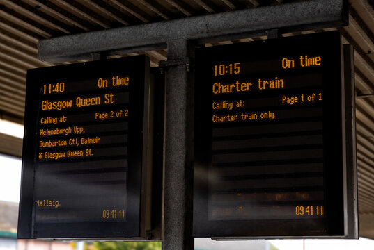 Electronic railway information sign on a railway station in the Highlands of Scotland, United Kingdom