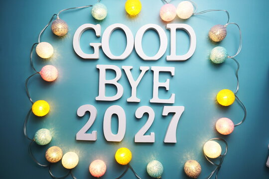 Goodbye 2027 alphabet letter with cotton ball LED decoration on blue background