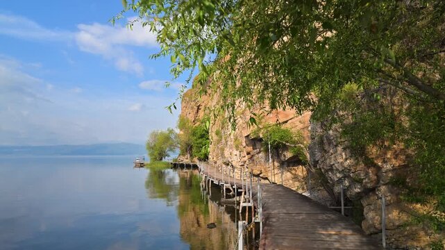 Morning walk along the Lake Ohrid wooden boardwalk