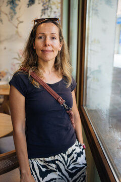 Attractive Freckled European Woman in Her 40s with Natural Beauty and Confident Expression