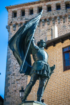 Juan Bravo statue with a raised banner in Segovia, Spain