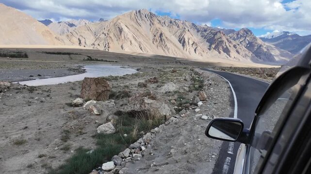 driving through the roads of Ladakh in the Indian Himalayas