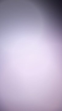 Soft purple gradient background with ethereal light leak effects, minimalist lavender abstract bokeh texture, dreamy pastel violet light transition