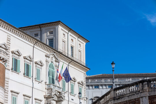 Quirinal palace in rome with italian and european union flags