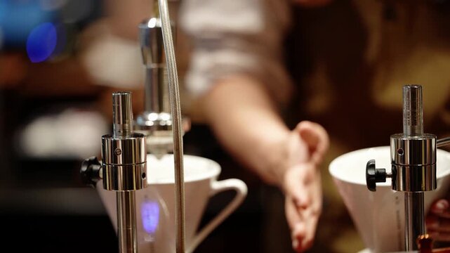 Barista hands tamp coffee into a portafilter above white ceramic pour-over drippers on a polished steel espresso bar in a Shanghai specialty cafe, close-up shallow focus