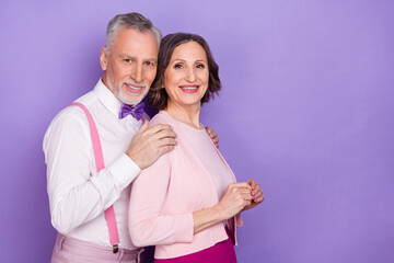 Profile portrait of peaceful partners hug care support empty space isolated on purple color background © deagreez