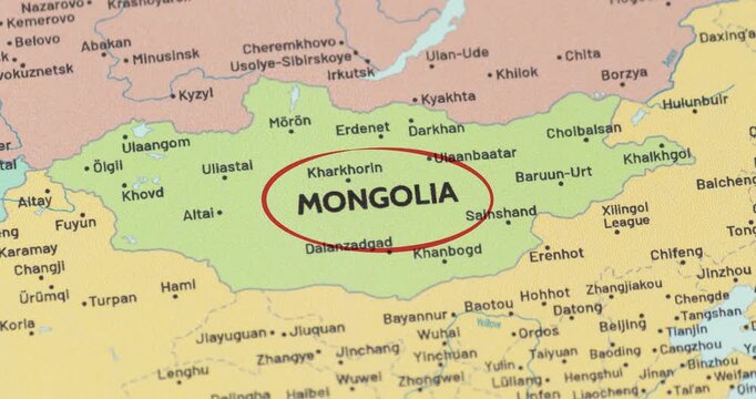 Detailed view of a red circle marking to mongolia on a modern political world map