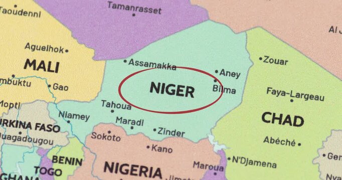 Detailed view of a red circle marking to niger on a modern political world map