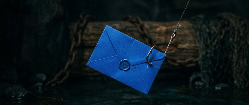 Blue Envelope with Wax Seal Dangling on Fishing Hook Symbolizing Deception or Entrapment