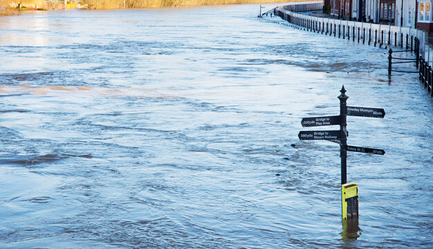 Bewdley floods partially submerge a tourist signpost,Bewdley Bridge,Worcestireshire,England,UK.