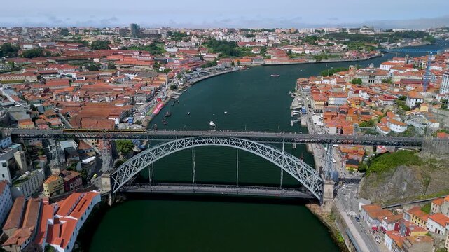An aerial shot of the Steel Arch of Dom Lu&iacute;s I Bridge Crossing the Douro at Porto