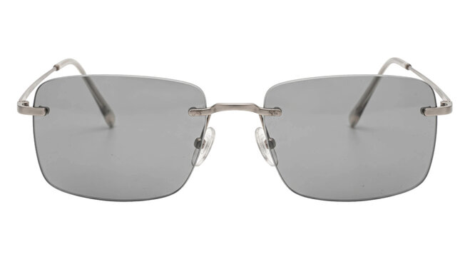 Rimless rectangular eyeglasses with gray lenses and a slim metal bridge on a black background