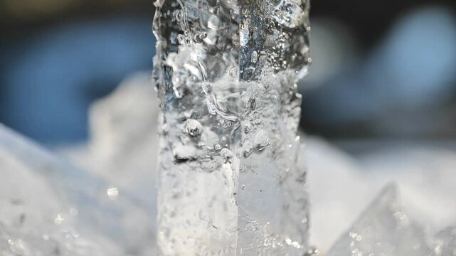 Icy winter wallpaper featuring the texture of a block of ice. Cold weather and the winter season. 4k footage
