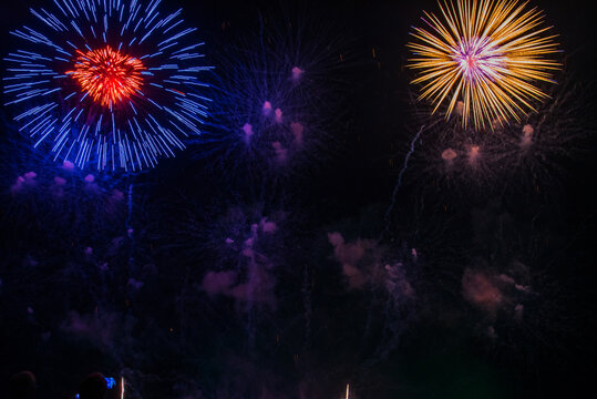 vibrant Colorful Firework celebrate anniversary happy new year 2027, 4th of july holiday festival. colorful firework night time to celebrate national holiday. countdown new year party 2026 background