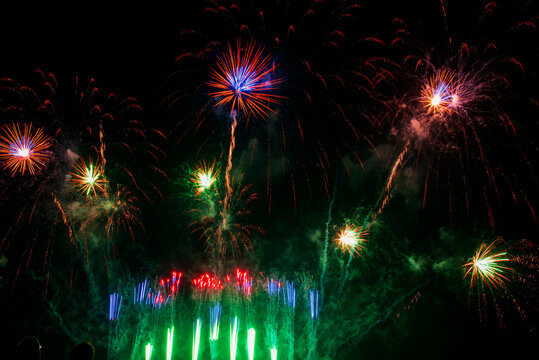 Green Firework celebrate anniversary happy new year 2026, 4th of july holiday festival. colorful firework night time to celebrate national holiday. countdown new year party 2027 background. Countdown